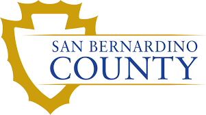 San Bernardino County Logo (yellow shield behind and to the left of San Bernardino County in navy and all capitals