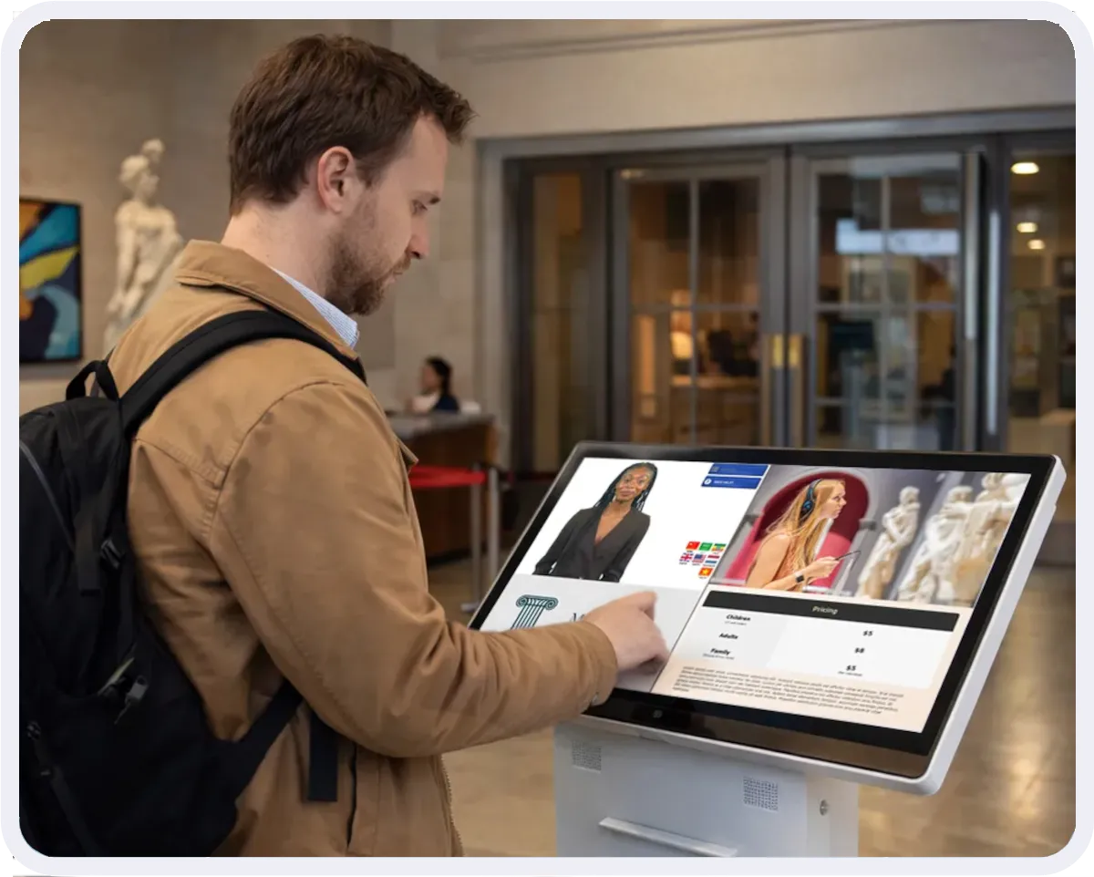 Visitor uses a visitor management kiosk to to view museum pricing.