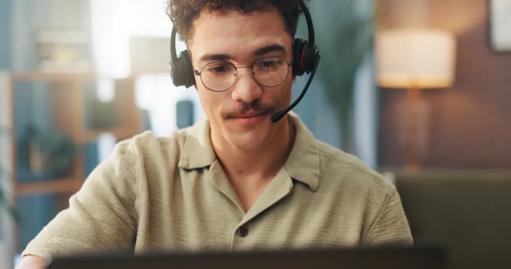 Remote receptionist responds to a call from a visitor check in kiosk.